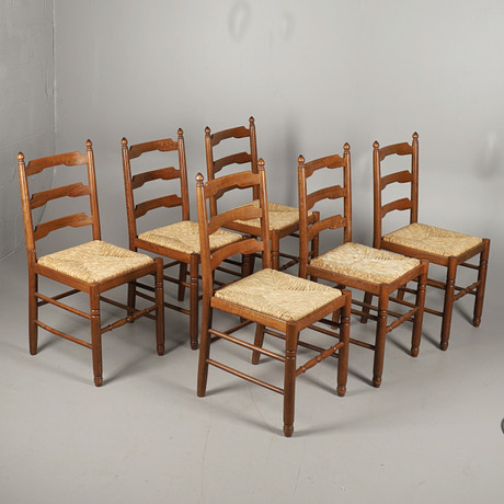 EN UPPSÄTTNING AV SEX VINTAGE BETSAD BOK OCH RUSA SITTANDE MATSTOLAR