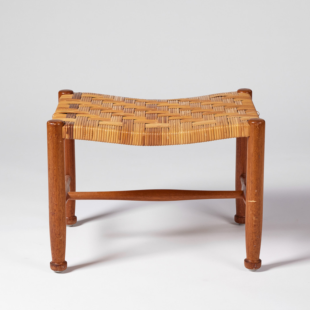 JOSEF FRANK. Stool, Firma Svenskt Tenn, model 686, teak, seat in wicker.