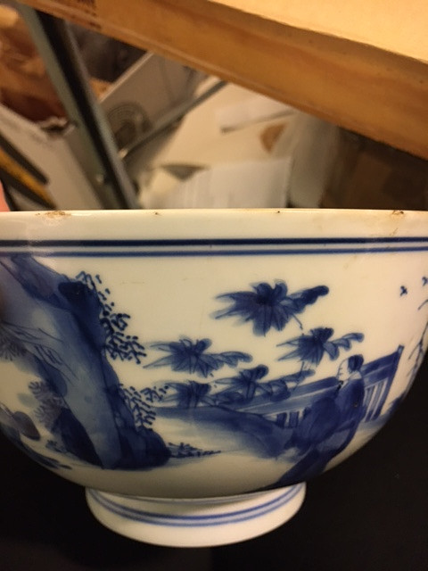 A BLUE AND WHITE BOWL.