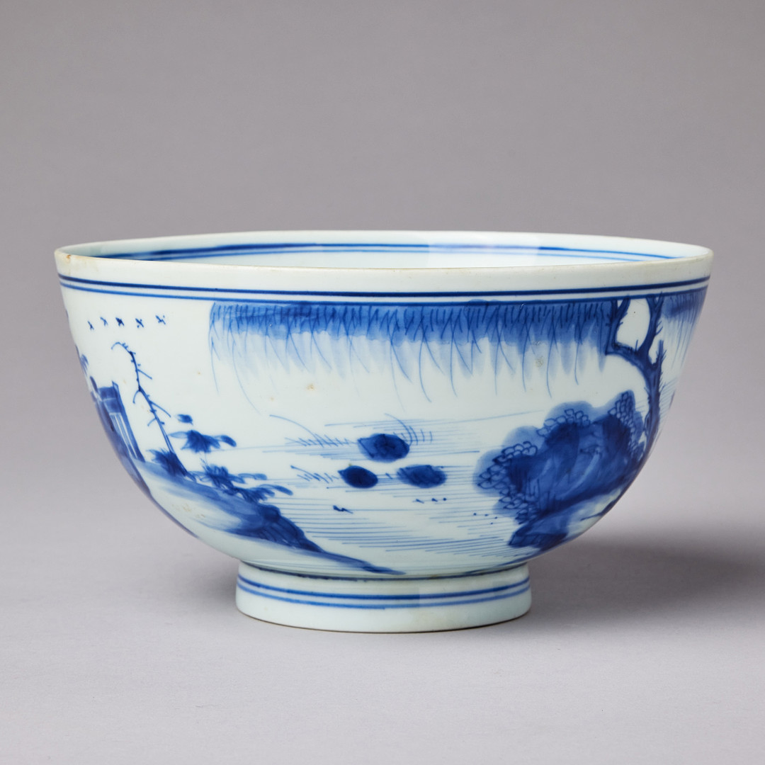 A BLUE AND WHITE BOWL.