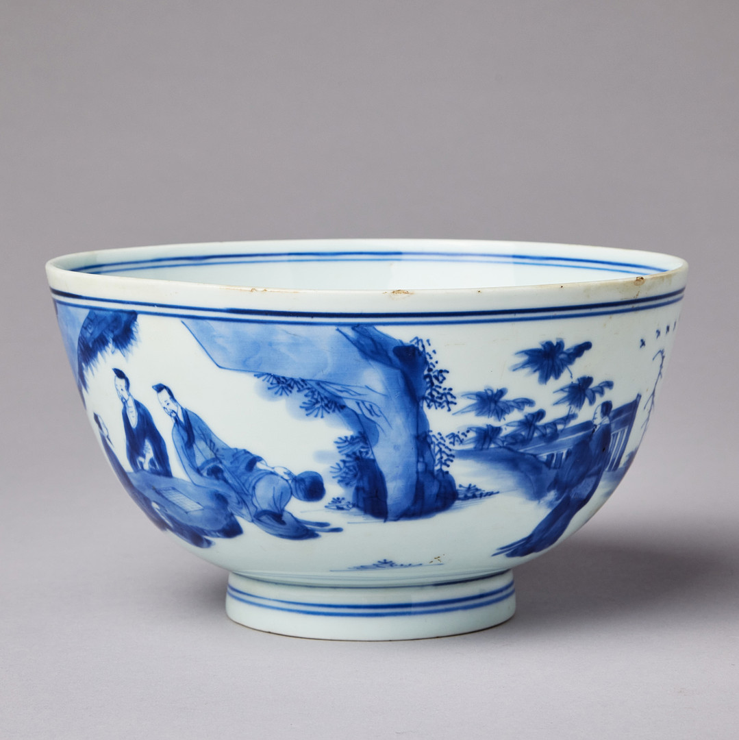 A BLUE AND WHITE BOWL.