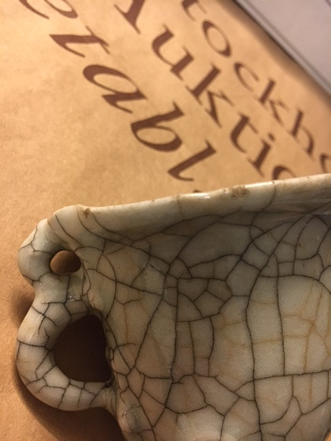 A GE-TYPE CHILONG-HANDLED CUP.