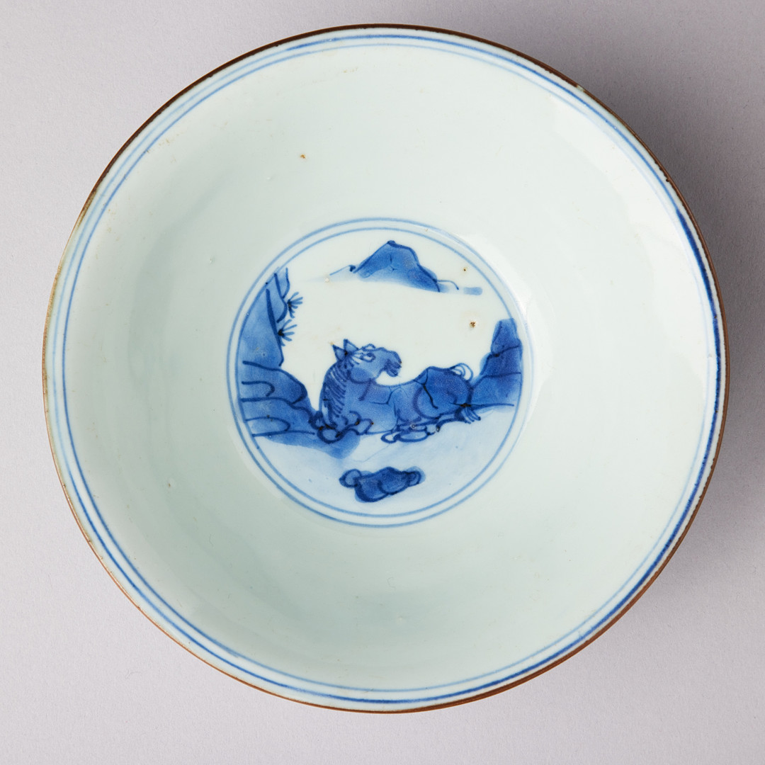A BLUE AND WHITE 'HORSES' BOWL.