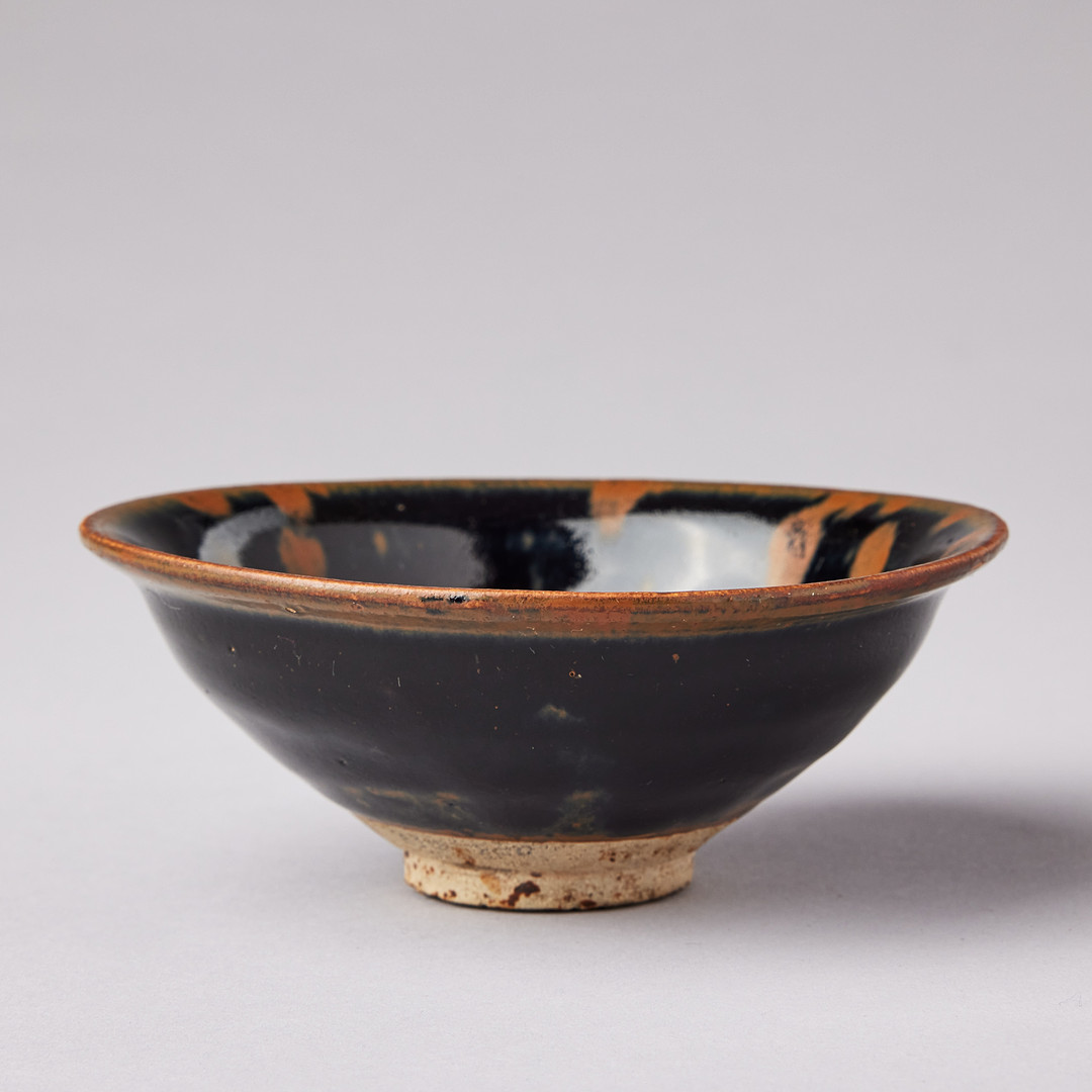 A HENAN RUSSET-SPLASHED BLACK-GLAZED BOWL.