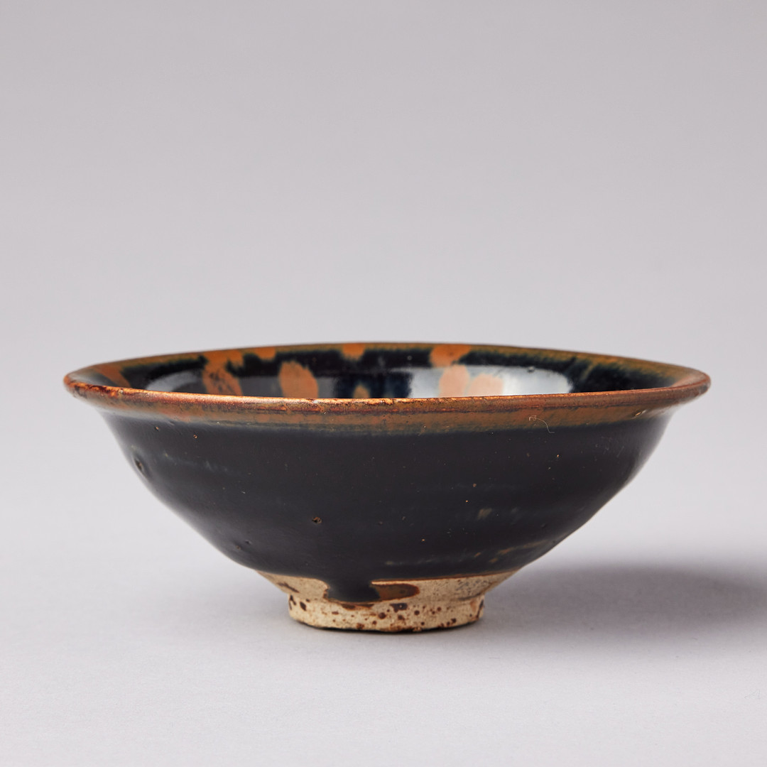 A HENAN RUSSET-SPLASHED BLACK-GLAZED BOWL.