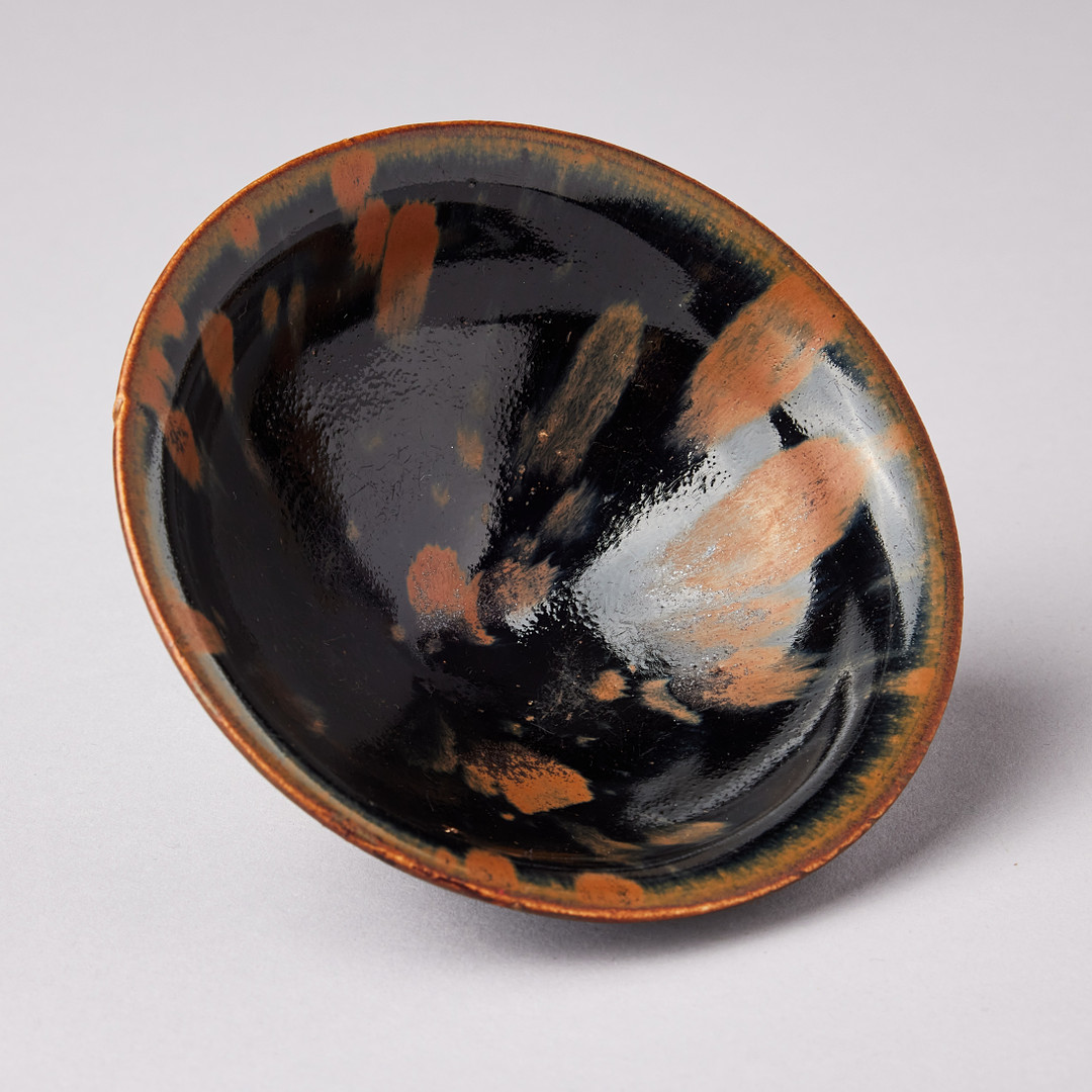A HENAN RUSSET-SPLASHED BLACK-GLAZED BOWL.