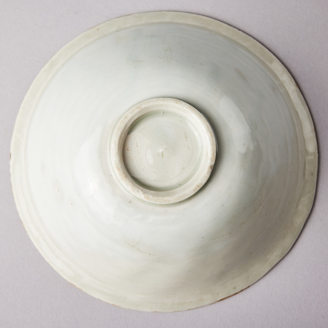 A MOULDED QINGBAI 'LOTUS' BOWL.