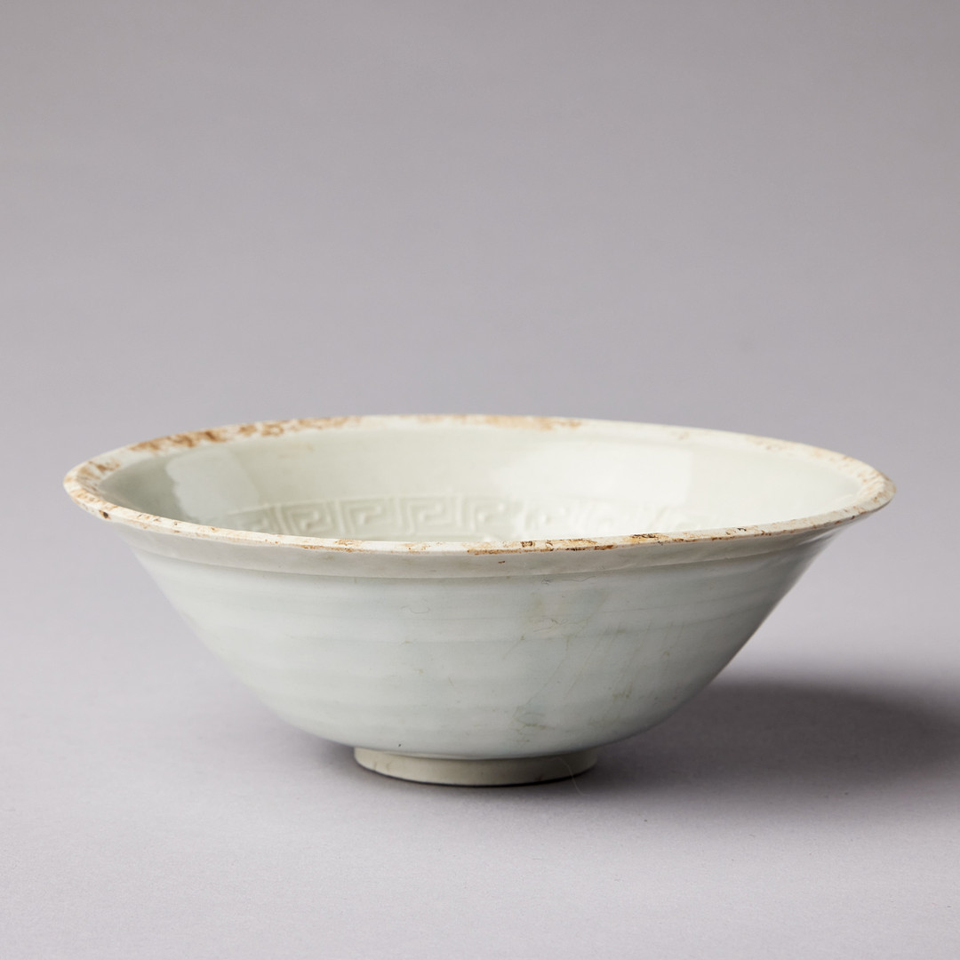 A MOULDED QINGBAI 'LOTUS' BOWL.