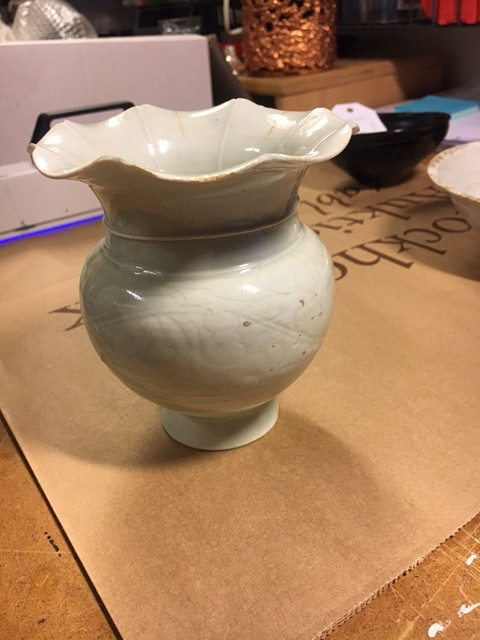 A QINGBAI CARVED BALUSTER VASE.