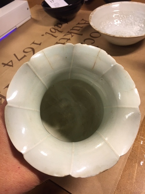 A QINGBAI CARVED BALUSTER VASE.