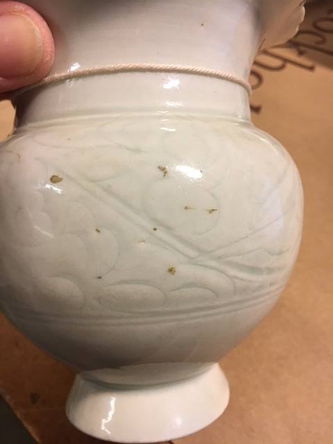 A QINGBAI CARVED BALUSTER VASE.