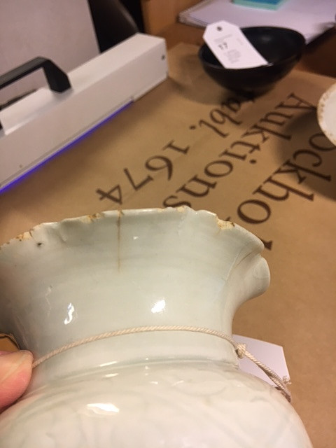A QINGBAI CARVED BALUSTER VASE.