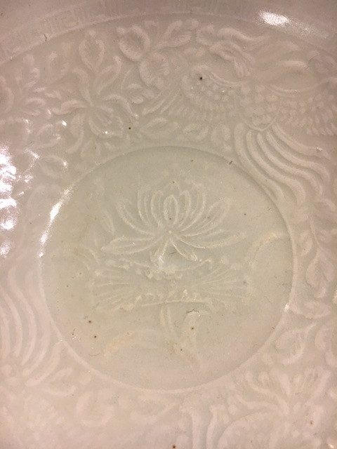 A MOULDED QINGBAI 'PHOENIX' BOWL.