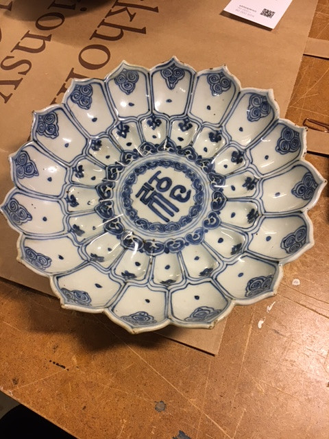 A RARE BLUE AND WHITE MOLDED 'LOTUS' DISH.