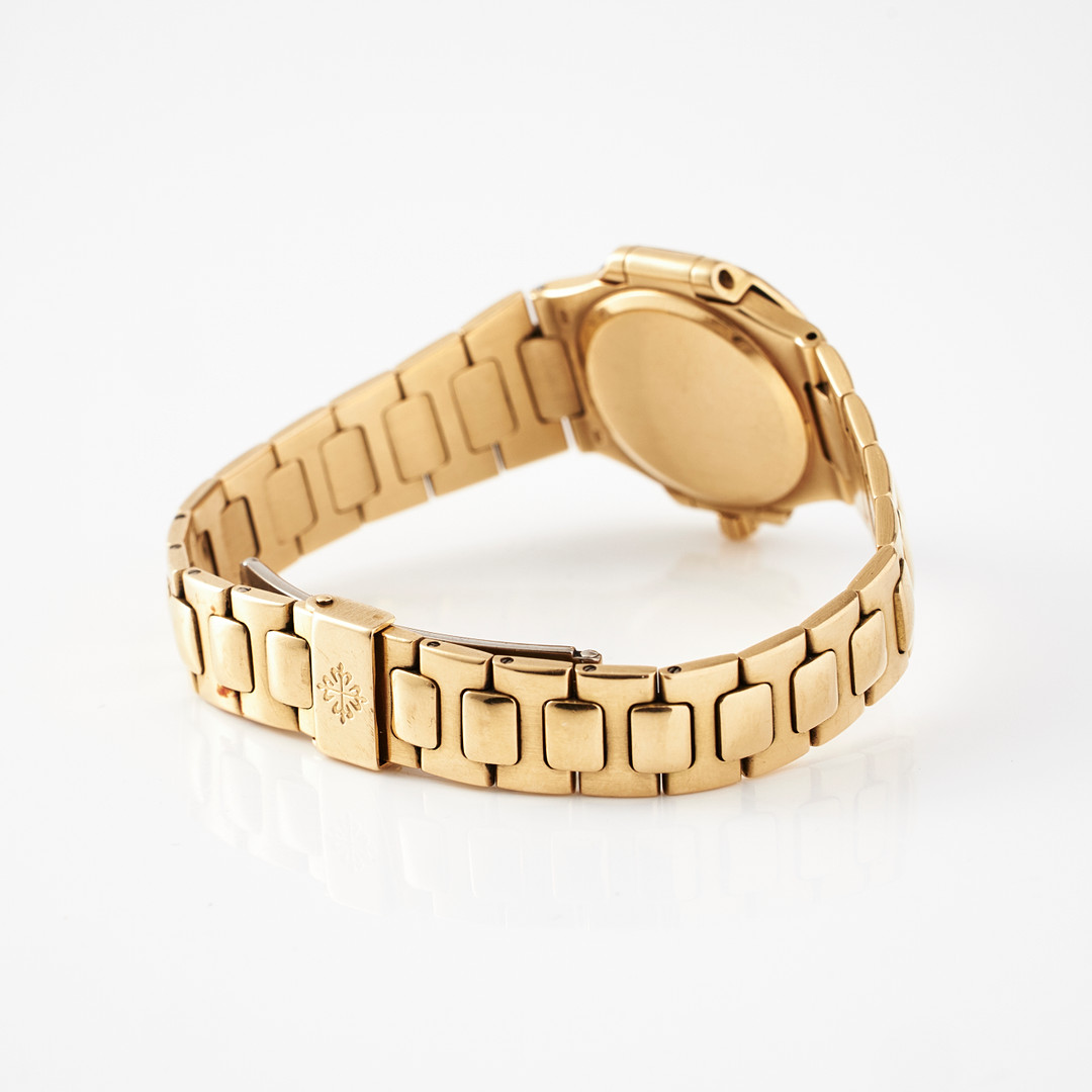PATEK PHILIPPE, damur, Nautilus, 18 k guld, ca 1986.