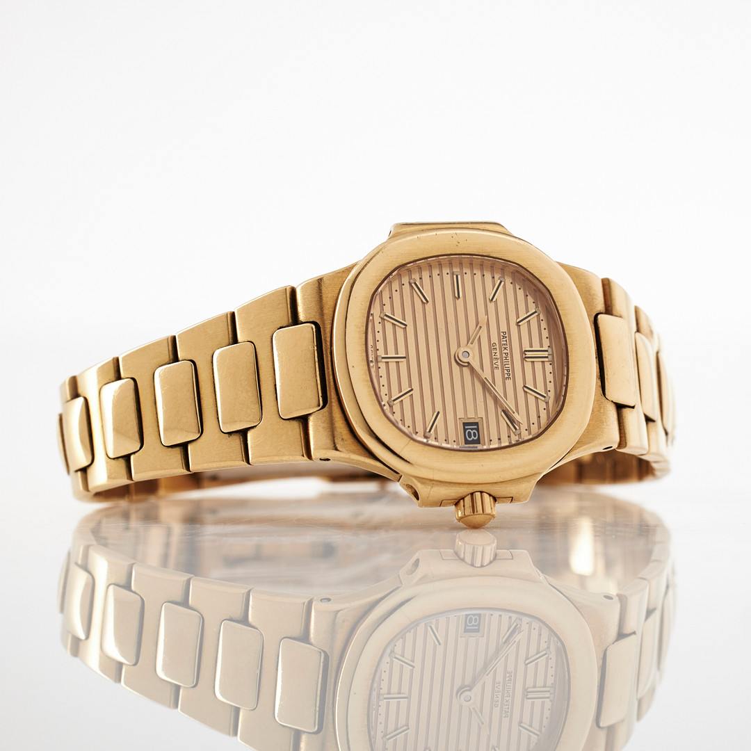 PATEK PHILIPPE, damur, Nautilus, 18 k guld, ca 1986.