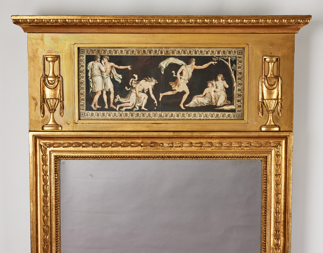 SPEGEL, sengustavianskt stockholmsarbete, omkring 1800, Pehr Ljungs art, träskuren dekor och pastellage, förgylld och bronserad.