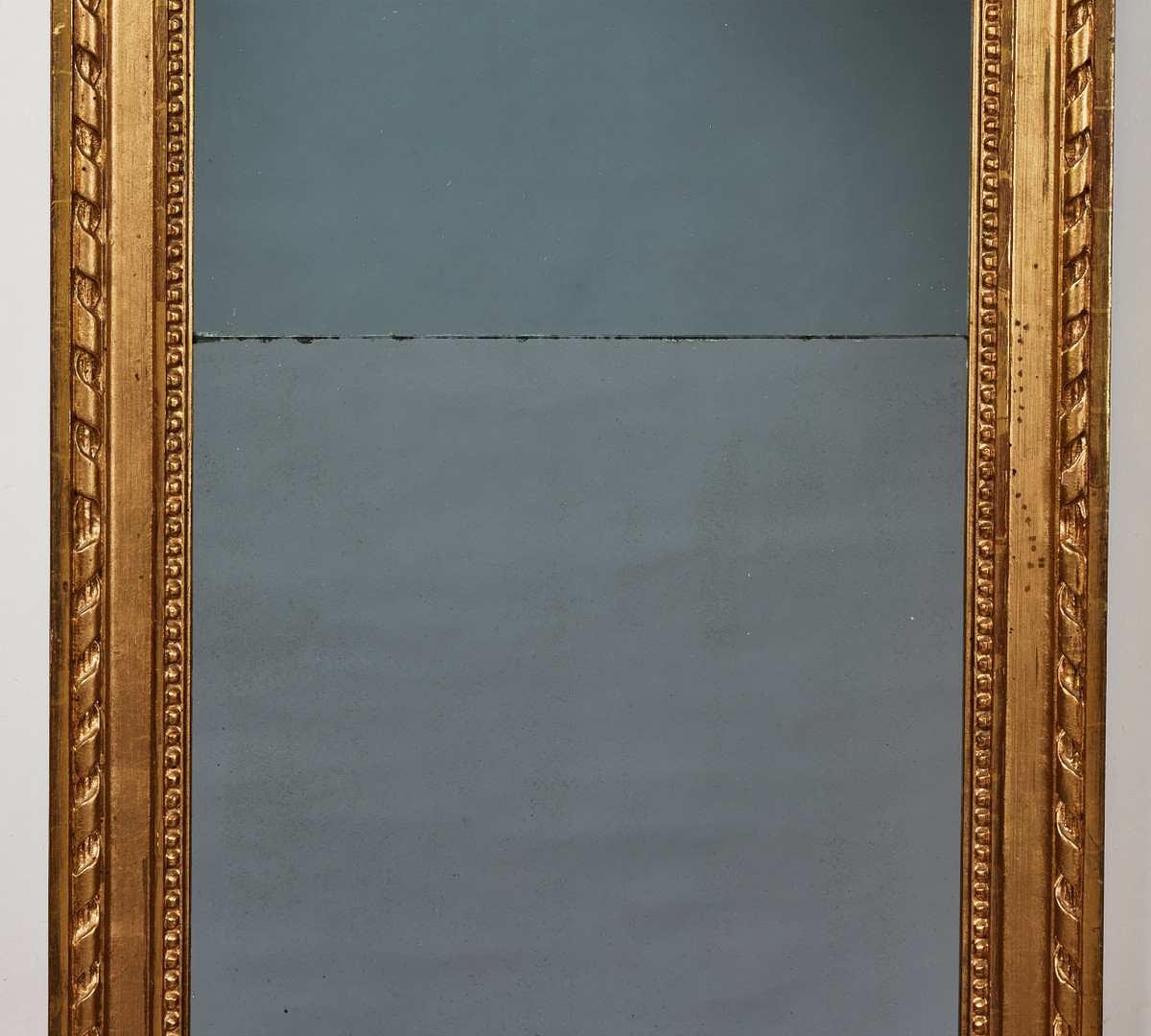 ERIC WAHLBERG (spegelmakare i Stockholm ca. 1760-1811) tillskriven, spegel, sengustavianskt stockholmsarbete, träskuren dekor, förgylld och bronserad.