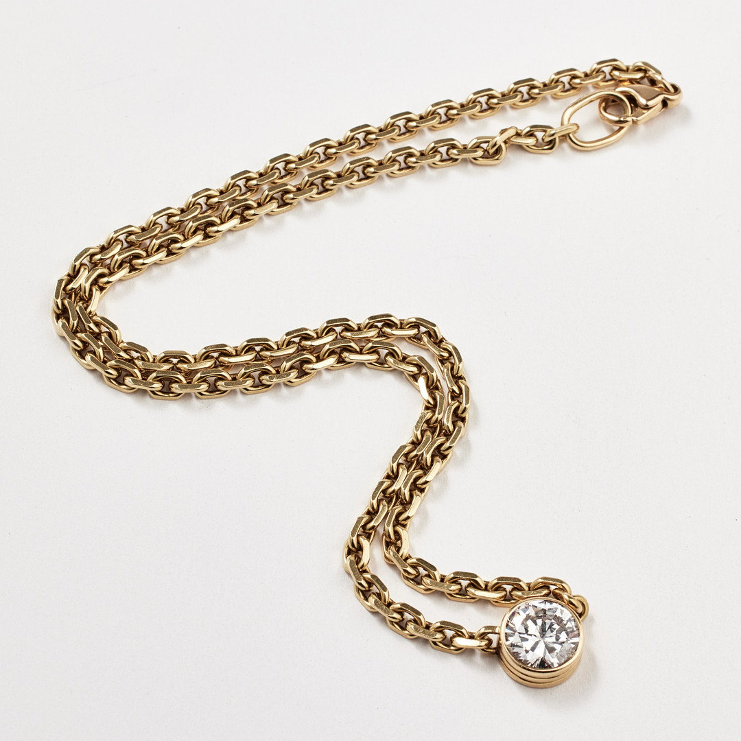 COLLIER, 18 k guld, mittparti med 1 briljantslipad diamant, ca 3,10 ct, kvalitet W(H)/I, ankarlänk.