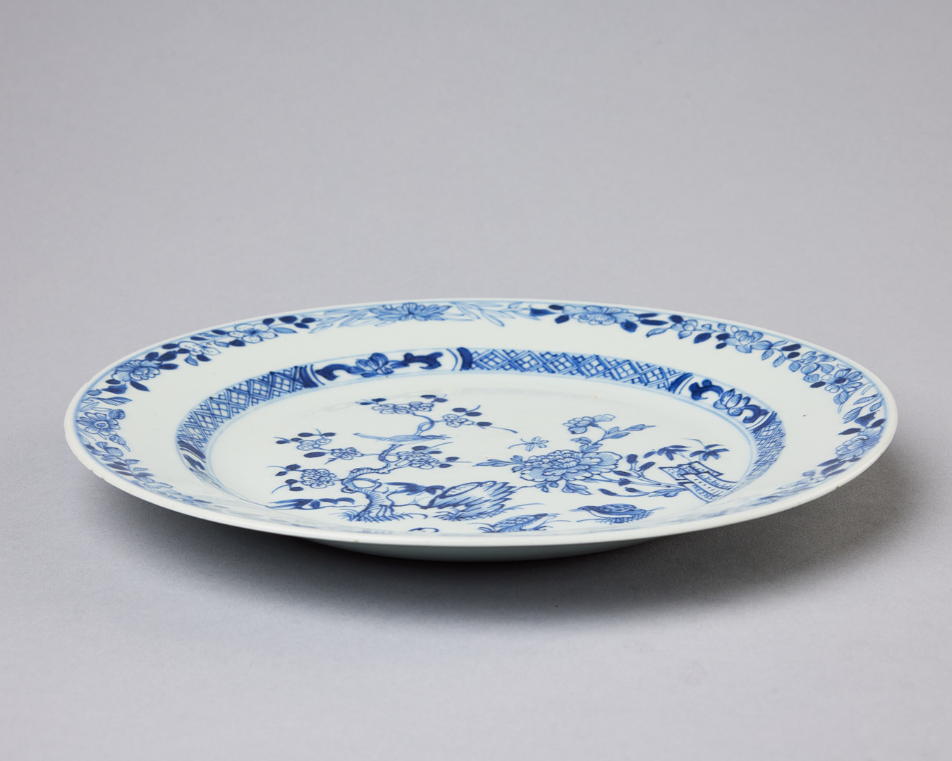 TALLRIKAR, 11 st, porslin, Kina, Qianlong (1736-1795), varierande dekor i underglasyrblått.