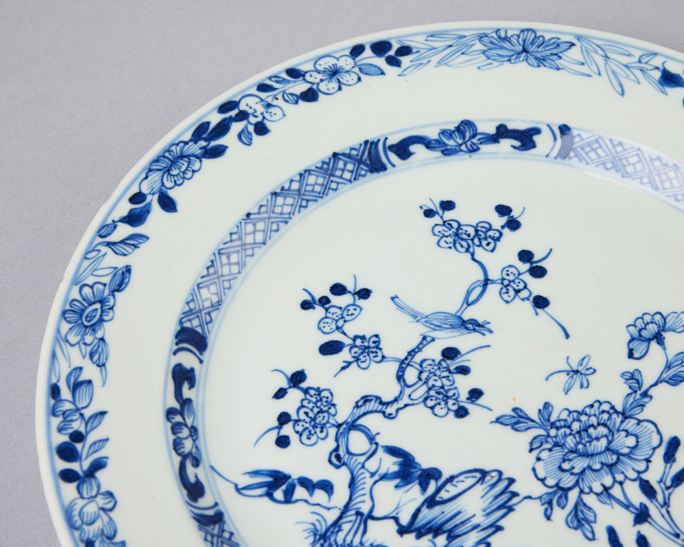 TALLRIKAR, 11 st, porslin, Kina, Qianlong (1736-1795), varierande dekor i underglasyrblått.