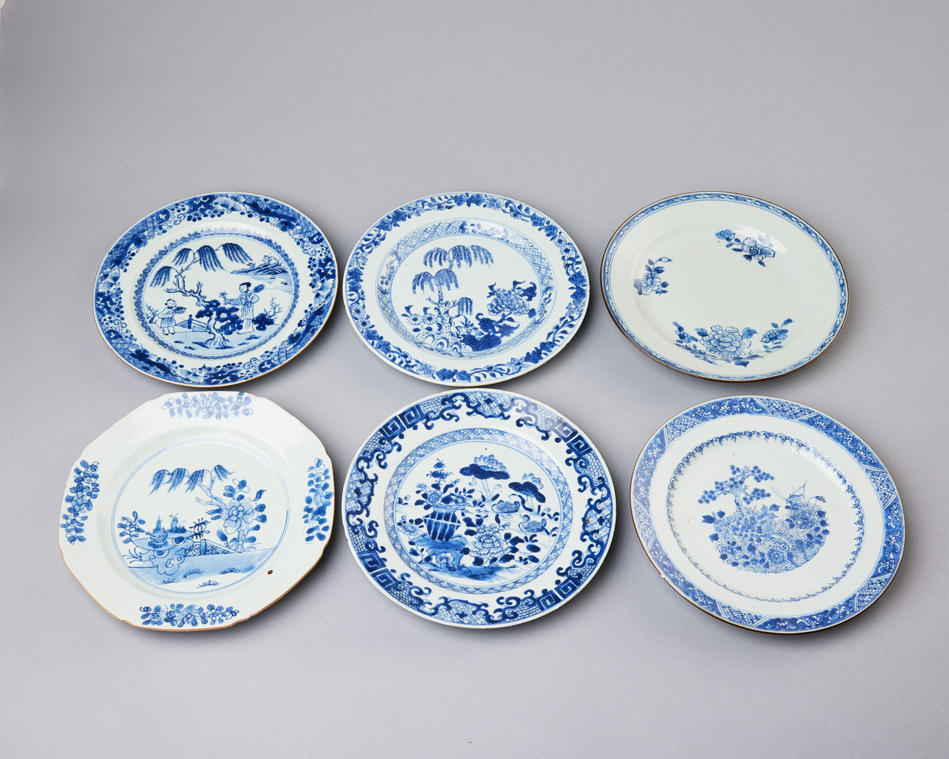 TALLRIKAR, 11 st, porslin, Kina, Qianlong (1736-1795), varierande dekor i underglasyrblått.