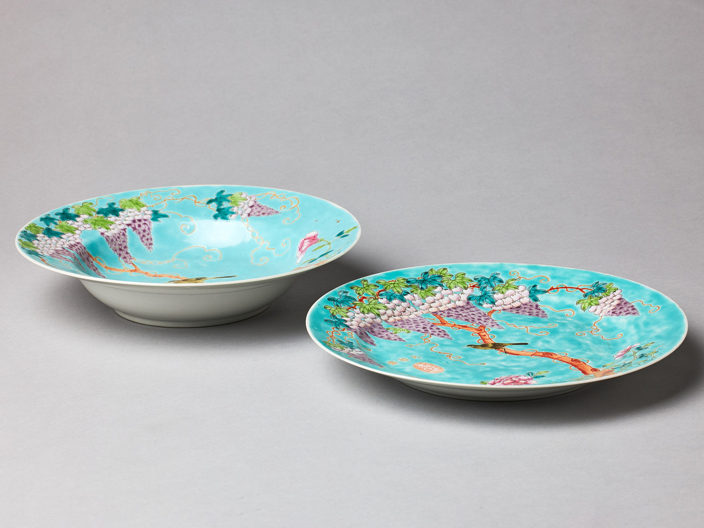 TWO DAYAZHAI FAMILLE ROSE TURQUOISE GROUND DISHES.