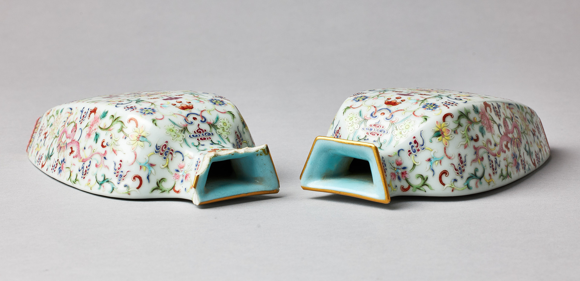 A PAIR OF FAMILLE ROSE WALL VASES.