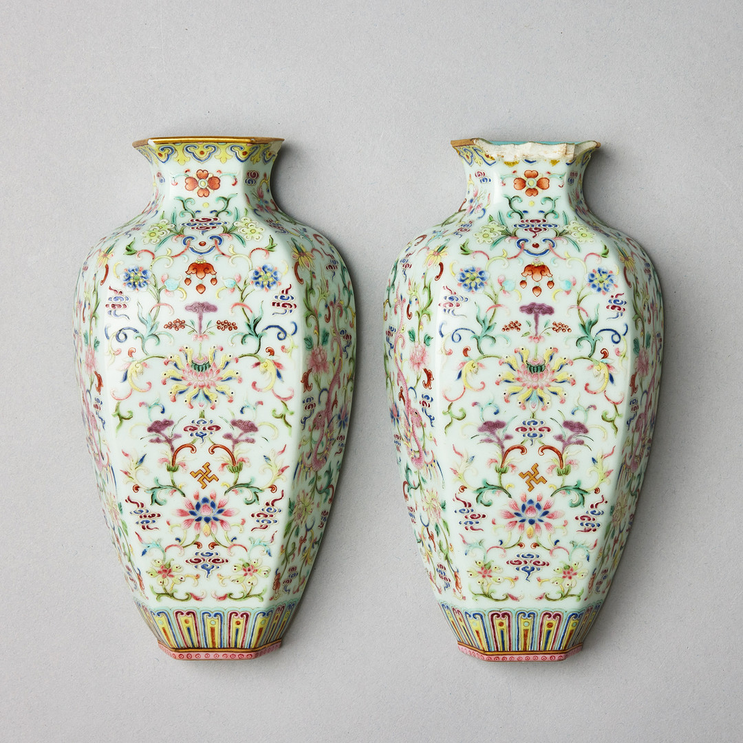 A PAIR OF FAMILLE ROSE WALL VASES.