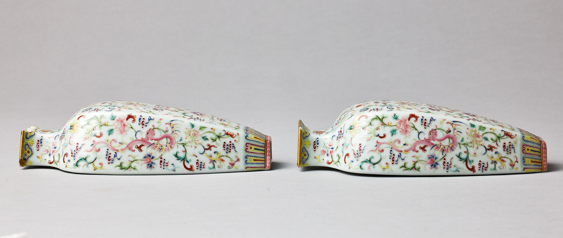 A PAIR OF FAMILLE ROSE WALL VASES.