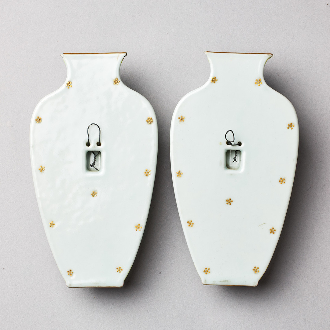 A PAIR OF FAMILLE ROSE WALL VASES.