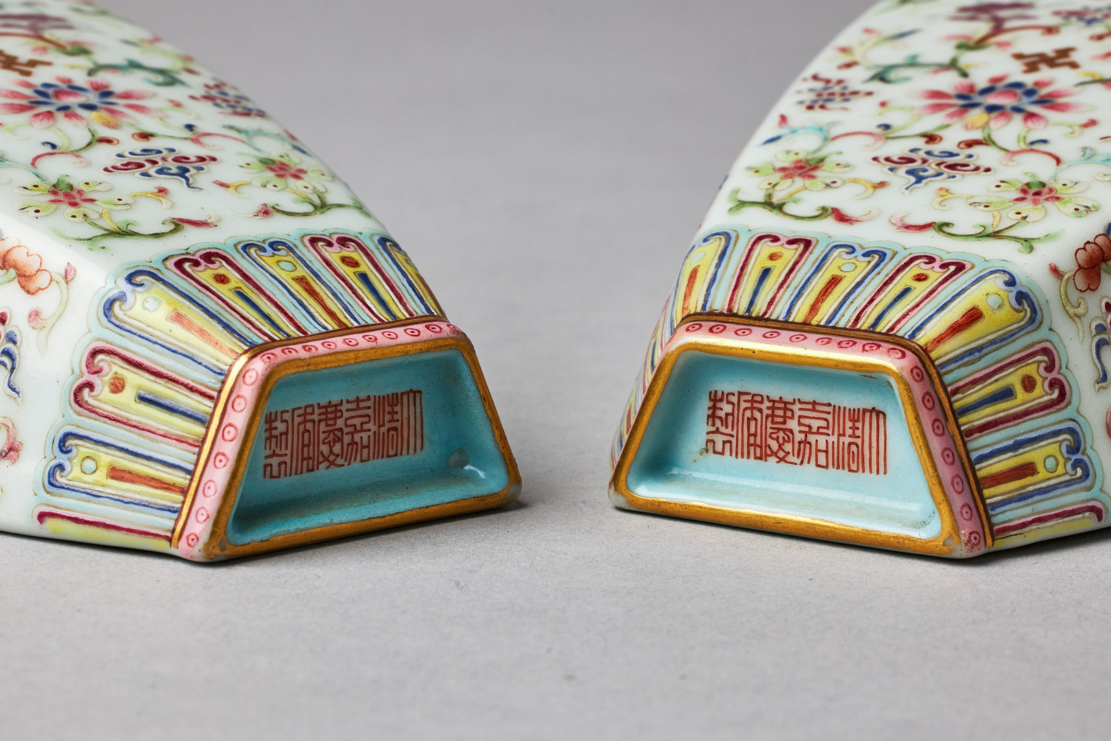 A PAIR OF FAMILLE ROSE WALL VASES.