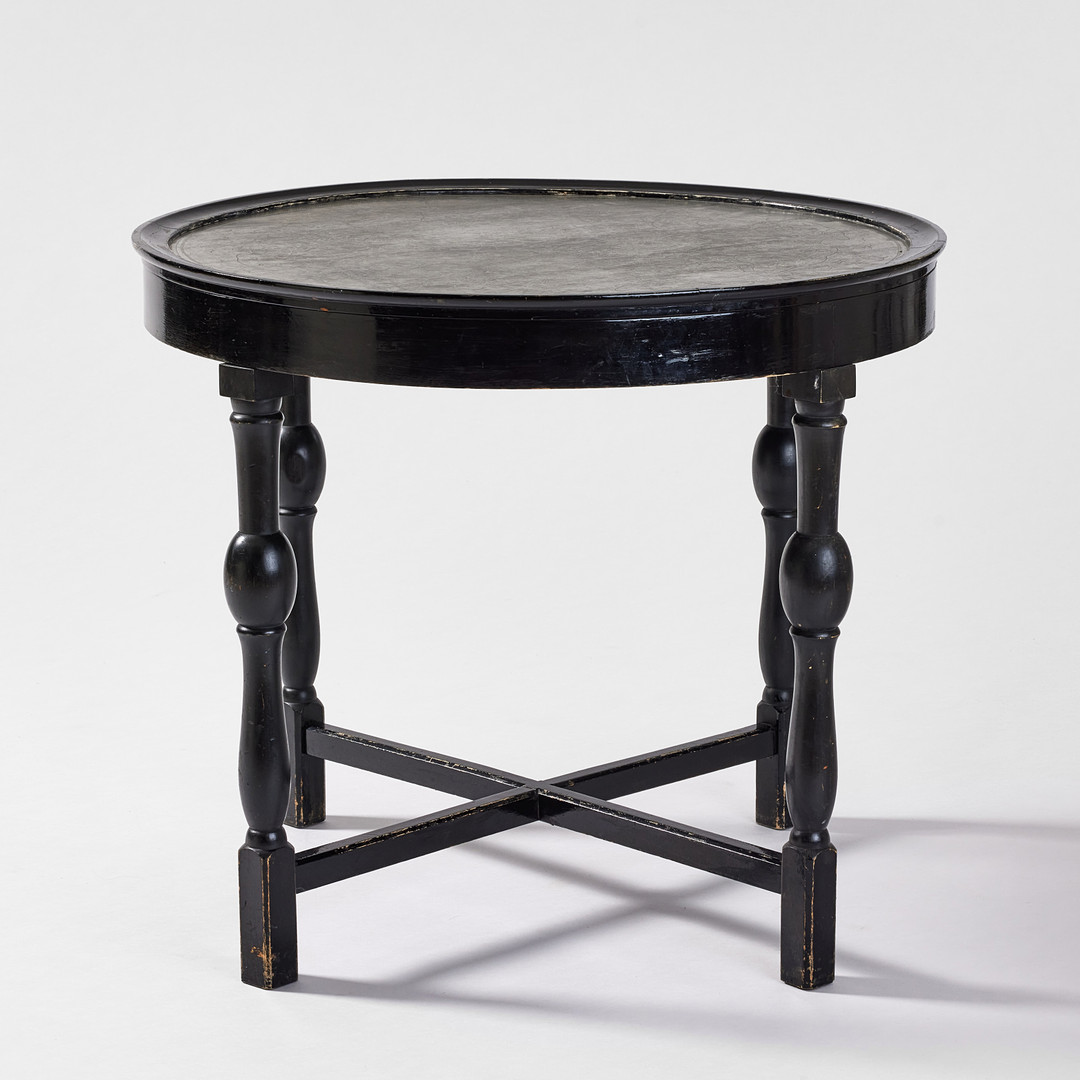 FIRMA SVENSKT TENN. Rökbord, Stockholm 1925/26, modell 254, skiva i tenn med figurscener av Nils Fougstedt, benställning i svartbonad björk utförd av Hjalmar Jackson.