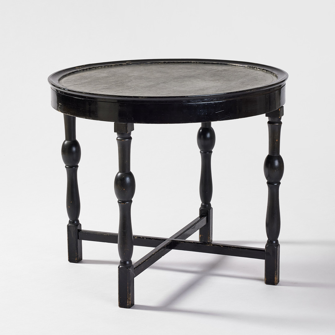 FIRMA SVENSKT TENN. Rökbord, Stockholm 1925/26, modell 254, skiva i tenn med figurscener av Nils Fougstedt, benställning i svartbonad björk utförd av Hjalmar Jackson.