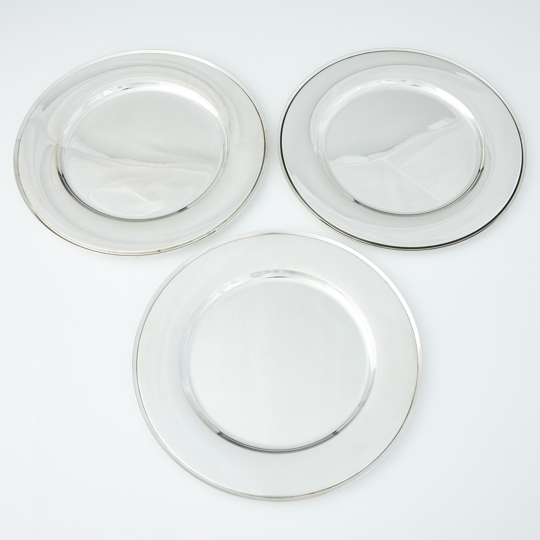 HARALD NIELSEN. Undertallrikar tolv stycken, sterlingsilver, Georg Jensen, Danmark efter 1945. Design nr 600 Y. 