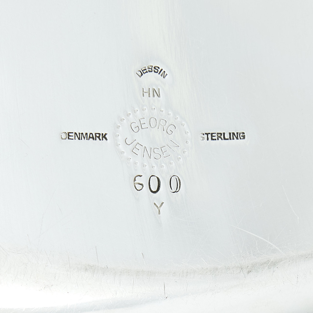HARALD NIELSEN. Undertallrikar tolv stycken, sterlingsilver, Georg Jensen, Danmark efter 1945. Design nr 600 Y. 