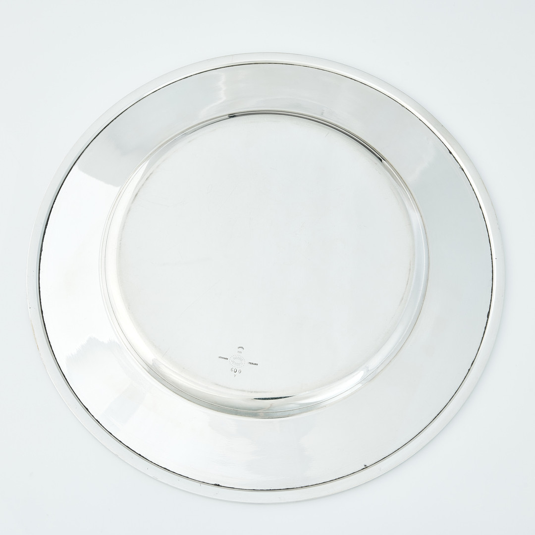 HARALD NIELSEN. Undertallrikar tolv stycken, sterlingsilver, Georg Jensen, Danmark efter 1945. Design nr 600 Y. 