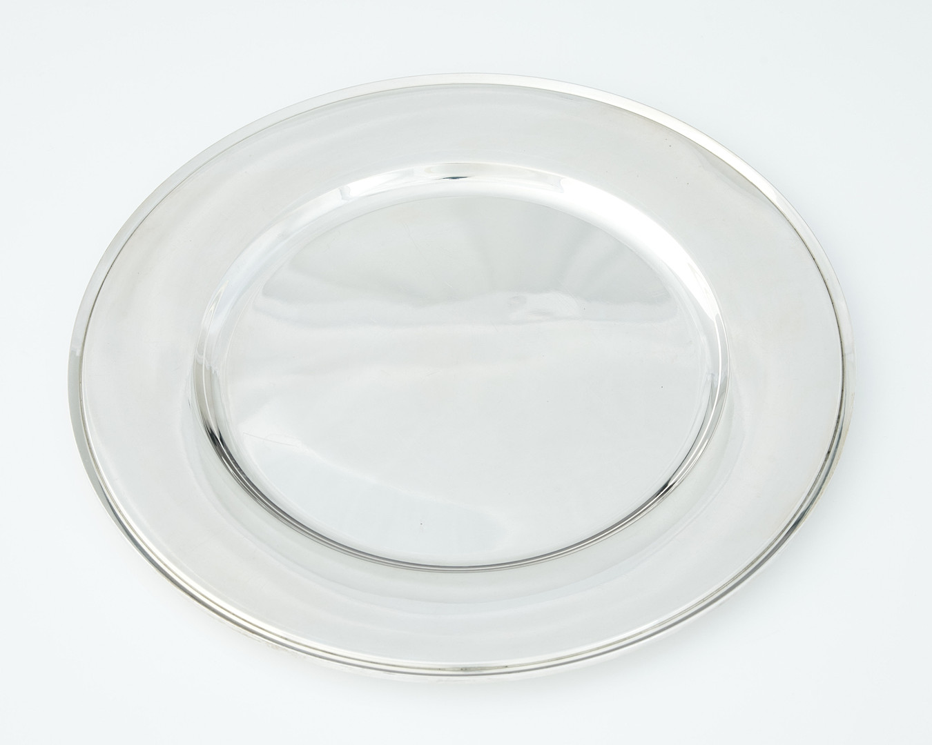 HARALD NIELSEN. Undertallrikar tolv stycken, sterlingsilver, Georg Jensen, Danmark efter 1945. Design nr 600 Y. 