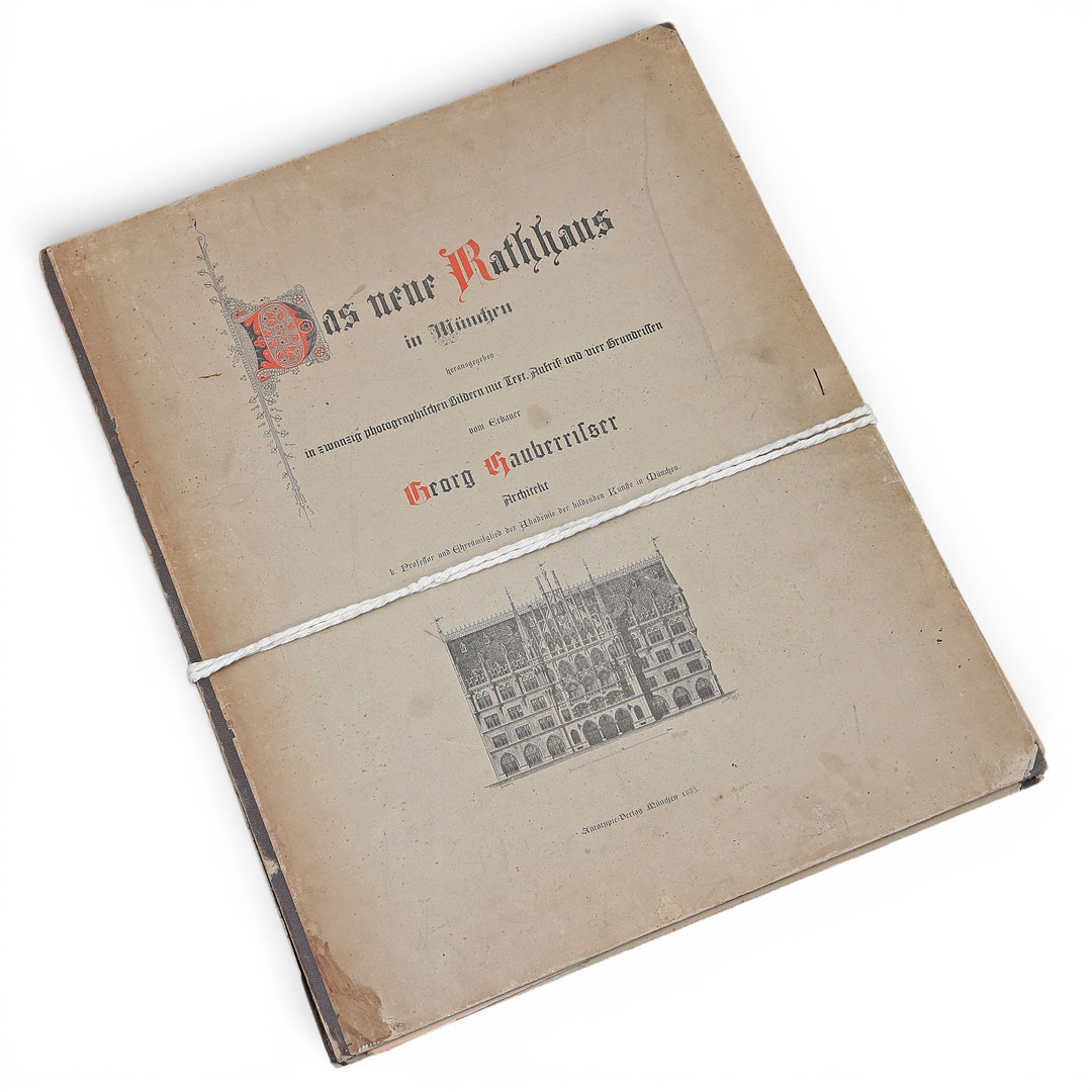 GEORG HAUBERRISSER. Das neue Rathaus in München (1883). Folder with 4 photographs (originally 6) from the edition that documents the first phase of construction of the New Munich City Hall.