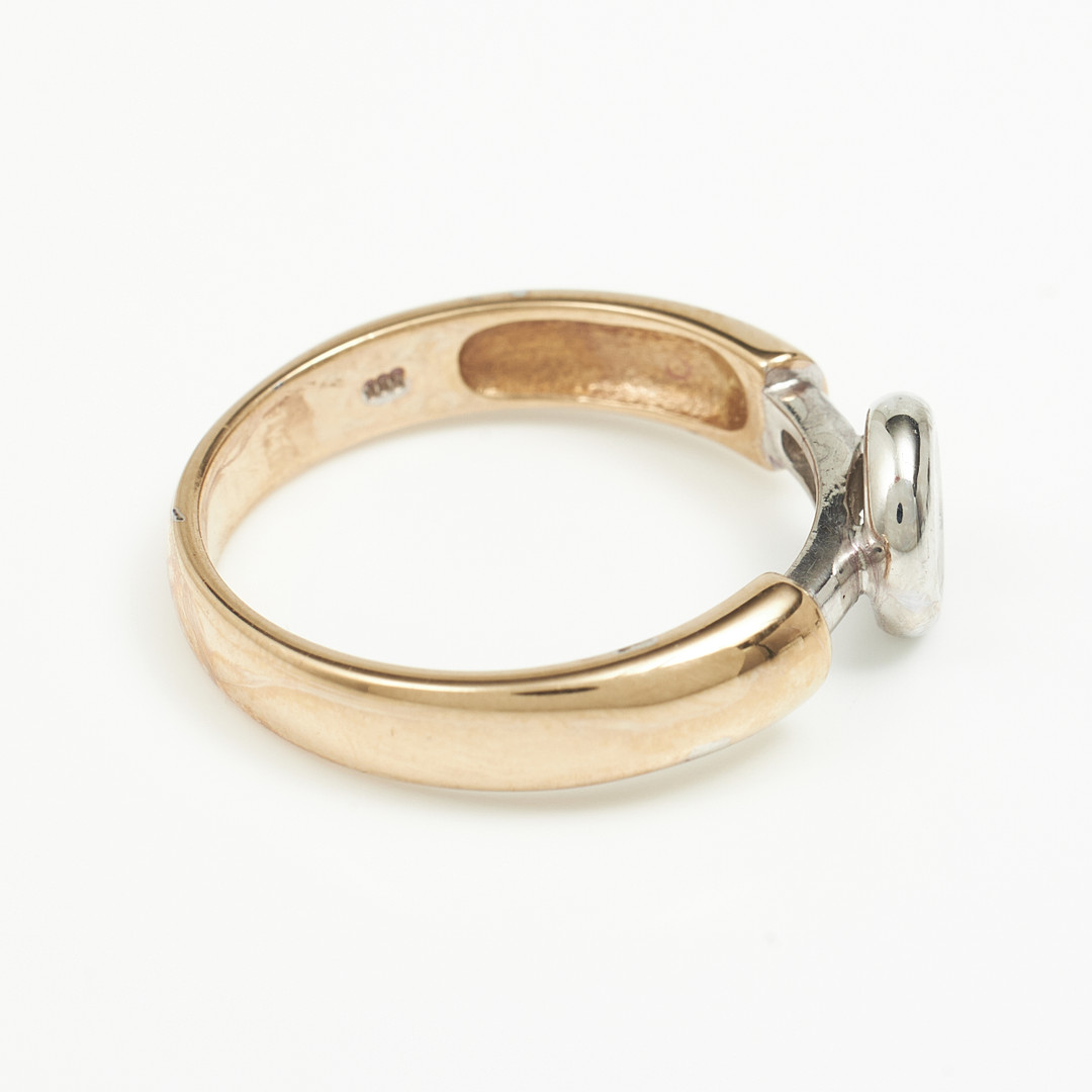 RING, 14 k röd/vitguld, briljant ca 0,30 ct, utländska stämplar.