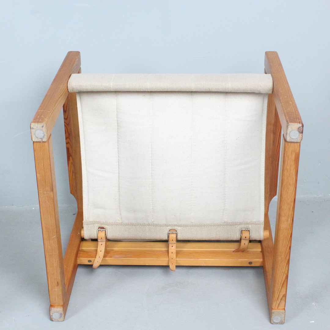 KARIN MOBRING. IKEA. Armlehnsessel / Safari-Chair, Modell 'Diana' / 'Diana Chair', mit Beistelltisch, Schweden, 1970er Jahre.
