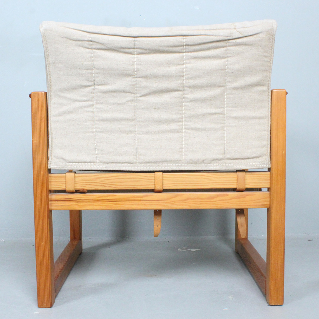 KARIN MOBRING. IKEA. Armlehnsessel / Safari-Chair, Modell 'Diana' / 'Diana Chair', mit Beistelltisch, Schweden, 1970er Jahre.