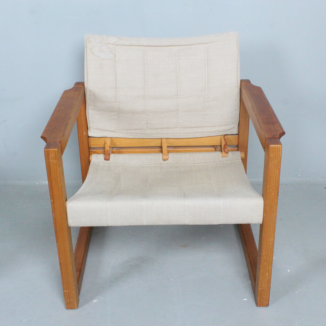 KARIN MOBRING. IKEA. Armlehnsessel / Safari-Chair, Modell 'Diana' / 'Diana Chair', mit Beistelltisch, Schweden, 1970er Jahre.
