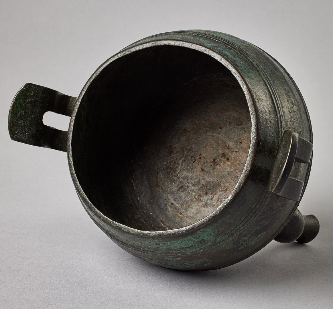 A BRONZE TRIPOD 'DING'​.