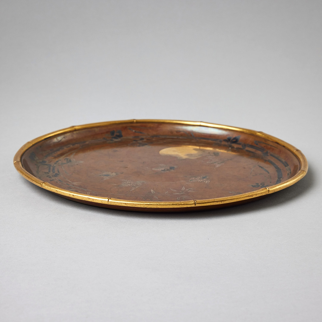 A JAPANESE BRONZE DISH INLAID WITH GOLD AND SILVER.