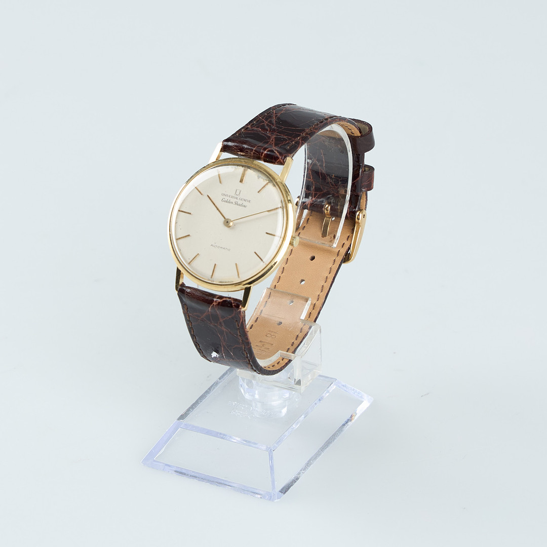UNIVERSAL GENEVE, Golden Shadow, 34 mm, 18K guld, automatisk, plexiglas, 1960-tal.