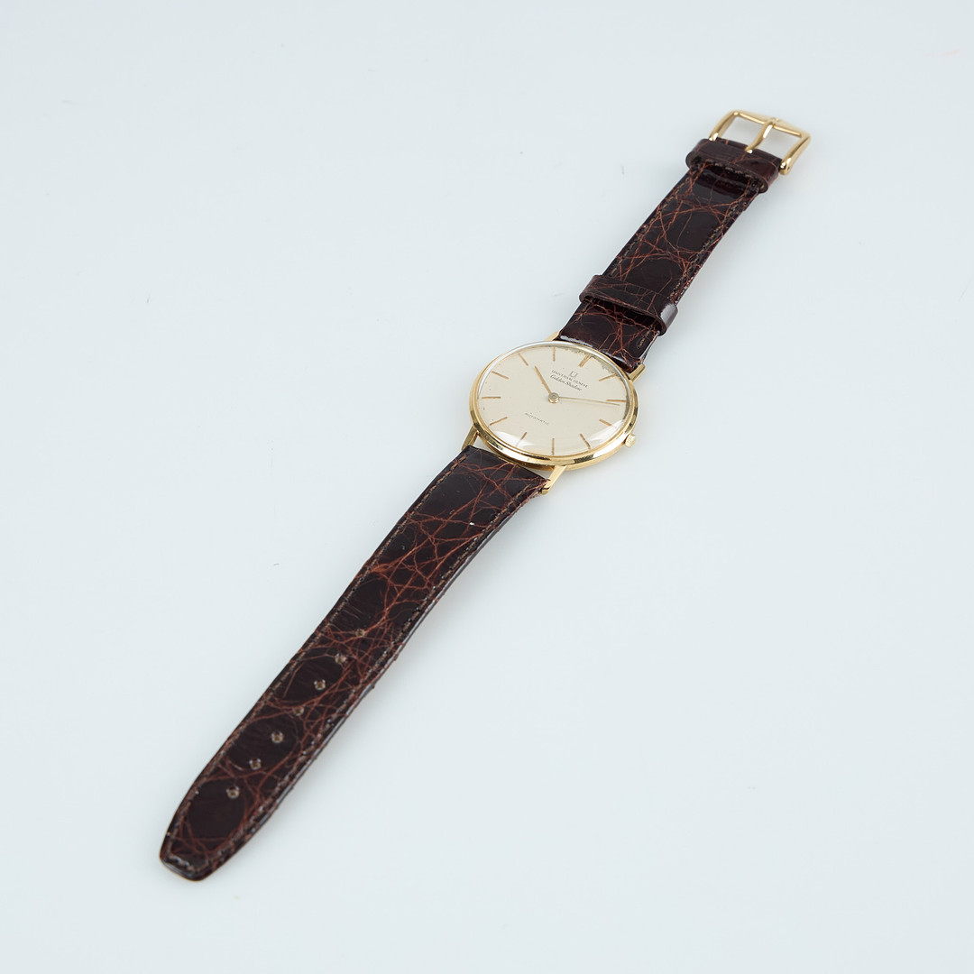 UNIVERSAL GENEVE, Golden Shadow, 34 mm, 18K guld, automatisk, plexiglas, 1960-tal.