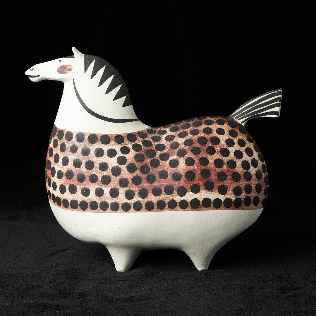 STIG LINDBERG. ”Springare”, figurin, glaserat lergods