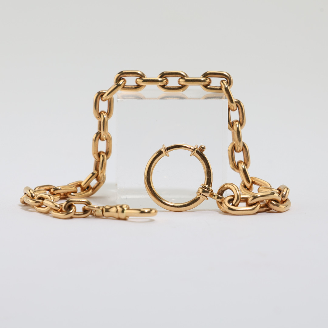 KLOCKKEDJA, 18K guld, Stockholm, 1910-/20-tal.