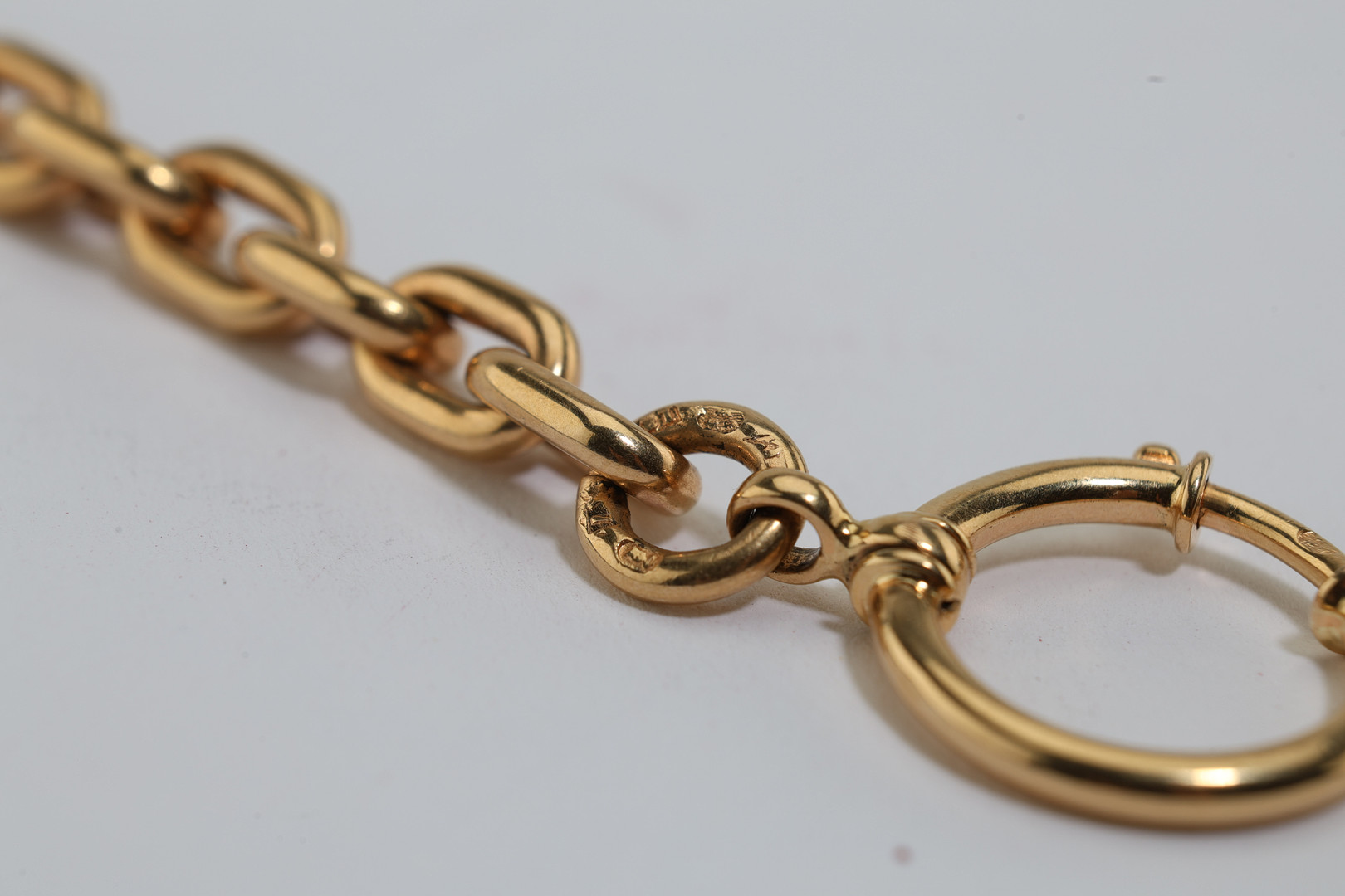 KLOCKKEDJA, 18K guld, Stockholm, 1910-/20-tal.
